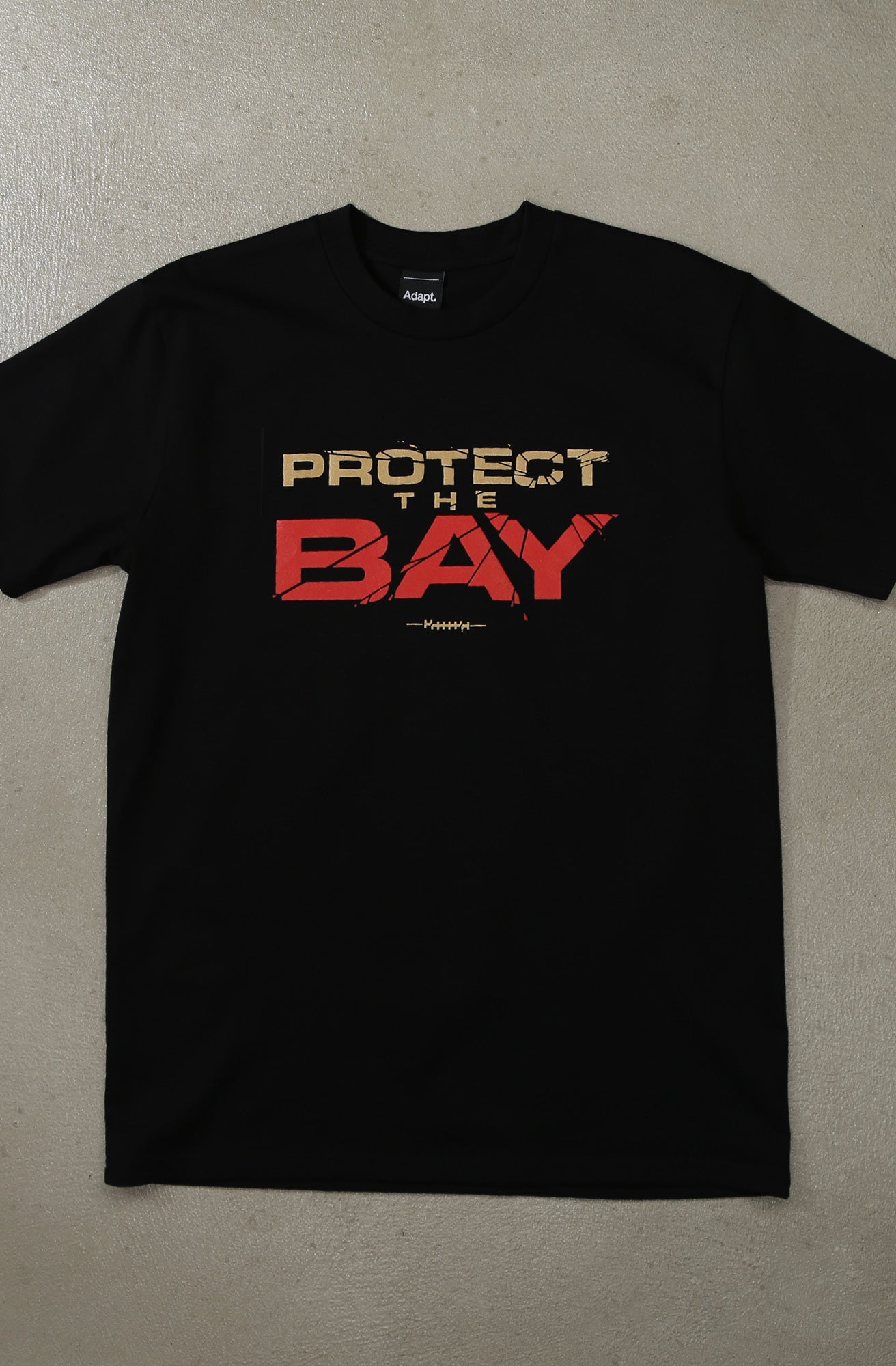 Dominick Puni x Adapt :: Protect The Bay (Men's Black Tee)