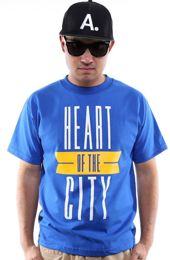 Breezy Excursion X Adapt :: Heart of the City (Men's Royal/Gold Tee)